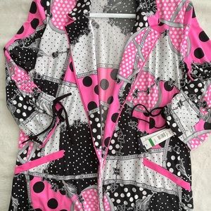 Nygard. Size L. Tag still on. Pink and black abstract design. Never been worn.